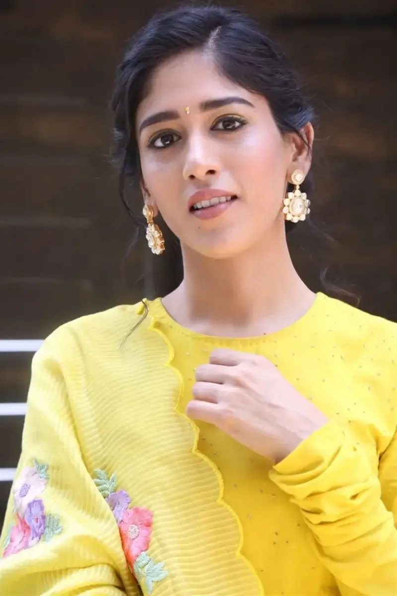 ACTRESS CHANDINI CHOWDARY IN YELLOW DRESS AT MOVIE TEASER LAUNCH 12